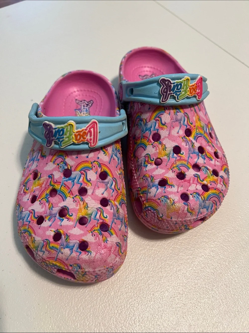 CROCS Pink Lisa Frank Print Clogs with Light Blue Strap